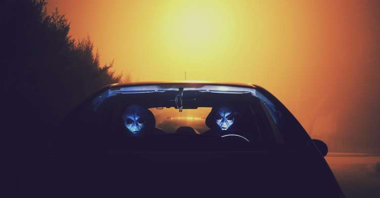two-alien-inside-car-wallpaper